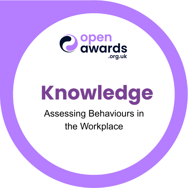 A circular badge with a purple border. The badge's background is white. The text "Training" is at the top, followed by "Assessing Behaviours in the Workplace" below it. At the top of the badge is the logo for "open awards" and the website address "openawards.org.uk".